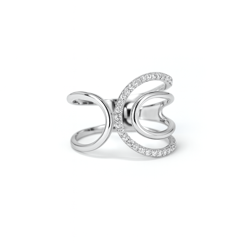 Anello oro bianco fantasia linee curve e diamanti taglio brillante